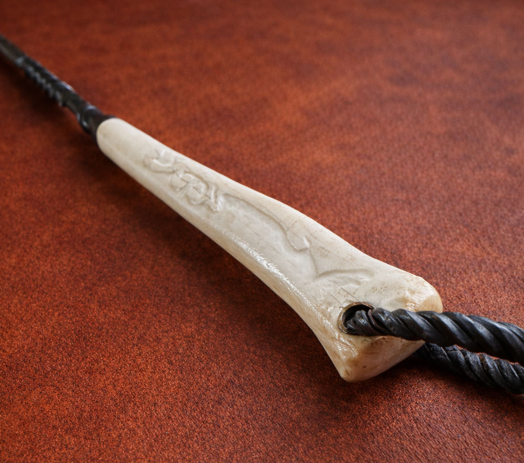 Hand forged steak turner carved bone handle detail