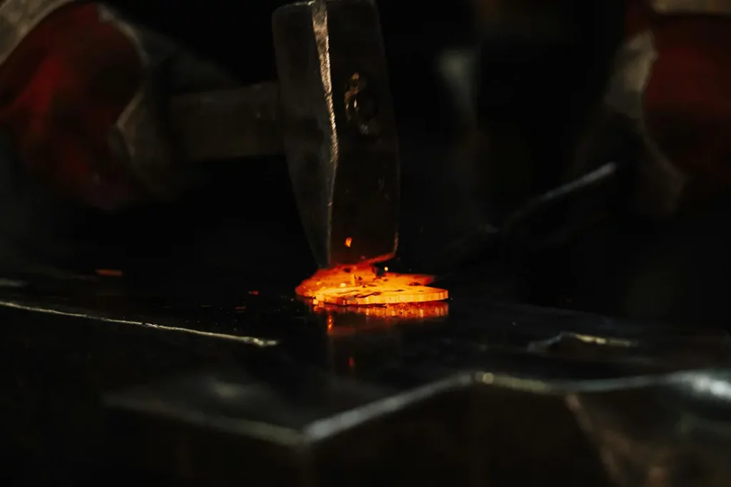 forging hot iron