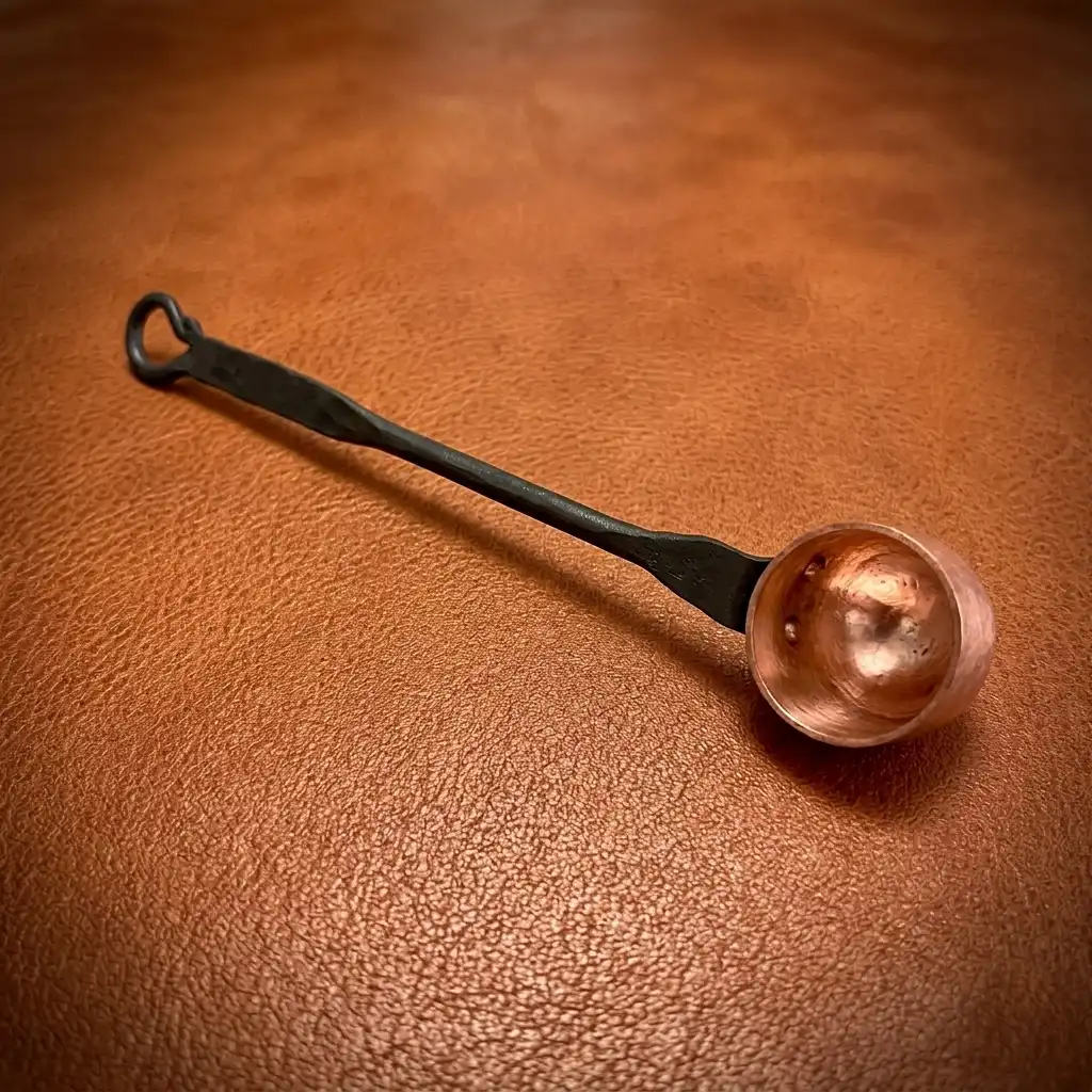 Artisan-crafted with a hammered bowl copper coffee scoop